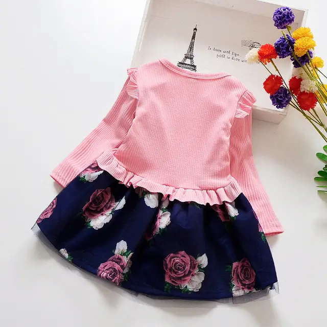 "Robe Bébé Fille Rouge à Motifs Floraux – Élégance et Douceur"