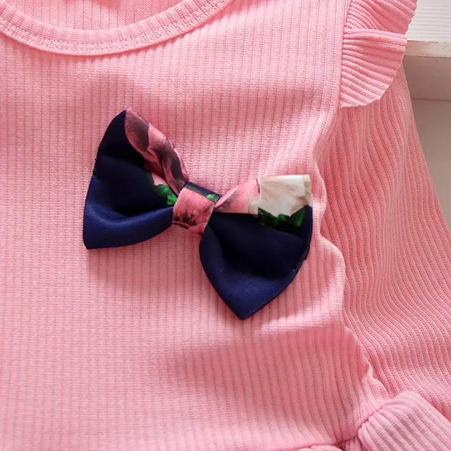 "Robe Bébé Fille Rouge à Motifs Floraux – Élégance et Douceur"
